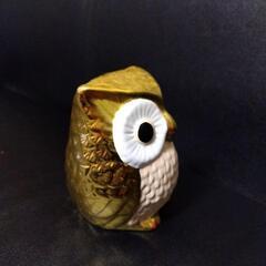 金のフクロウのオブジェの画像