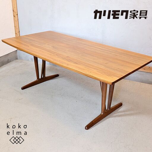 karimoku(カリモク家具)のウォールナット材を使用したCW6003 ダイニングテーブルです。片側がR形になった優しいデザインの食堂テーブルは北欧スタイルやカフェスタイルなどにもおススメです！