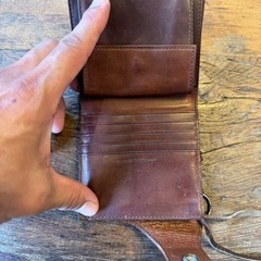 値下げポーターの革財布の画像