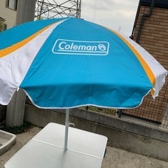 コールマンテーブルセットとパラソル(再募集)の画像