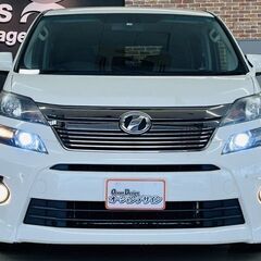 【車検2年付】【トヨタ ヴェルファイア 2.4Z Gエディション】ナビ フルセグTV カラーバックカメラ 両側パワースライドドア パワーバッグドア クルーズコントロール 外品AW 盗難防止装置 オットマン スマートキー 電動シート 3列シート ウォークスルー HID 電動リアゲート パールホワイトの画像