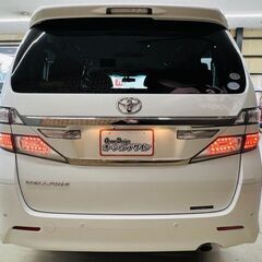 【車検2年付】【トヨタ ヴェルファイア 2.4Z Gエディション】ナビ フルセグTV カラーバックカメラ 両側パワースライドドア パワーバッグドア クルーズコントロール 外品AW 盗難防止装置 オットマン スマートキー 電動シート 3列シート ウォークスルー HID 電動リアゲート パールホワイトの画像