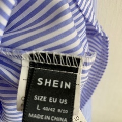 新品未使用 
SHEIN購入 フリルシャツの画像