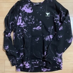 メンズ服とビジネス本の画像