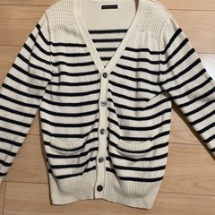 メンズ服とビジネス本の画像