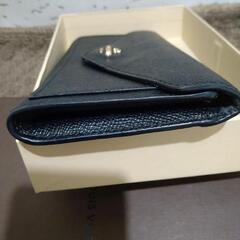 値下げしました。COACH長財布。の画像