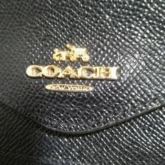 値下げしました。COACH長財布。の画像