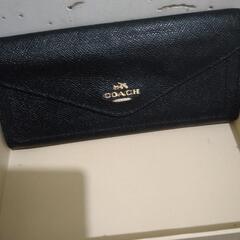 値下げしました。COACH長財布。の画像