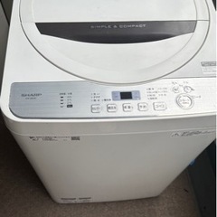 洗濯機と電子レンジセットの画像