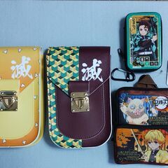 鬼滅の刃の缶ケース＋ミニリュック、『滅』のポーチ２個　　計４個セ...