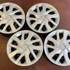 ホンダ14インチ4穴鉄ホイールPCD100球面座ホイールキャップ付き4本の画像