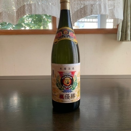2003 年　阪神タイガース優勝記念ボトル1800ml　43度　
本場泡盛　多良川酒造　美ら寅