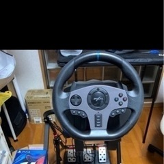 ps4とレーシングシューミレーション付きの画像