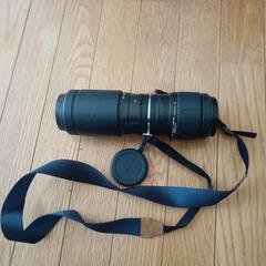 カメラレンズ持ち運び首掛け道具。新品の画像