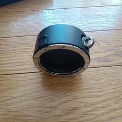 カメラレンズ持ち運び首掛け道具。新品の画像