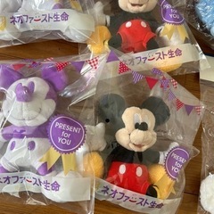 ミッキーマウス、スティッチのがま口の画像