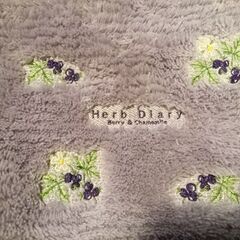 ラベンダー色のトイレカバーの画像