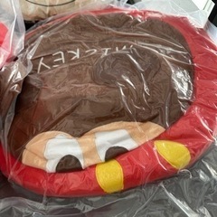 すみっこぐらしとミッキーのクッションの画像