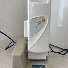 Panasonic電動アシストバッテリーと充電器の画像