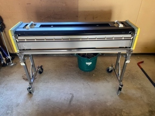 クロス糊付け機