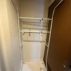 洗濯機　収納ポールの画像