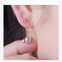 j→→→m17-7ムーンストーン調天使の翼ピアスホワイトの画像