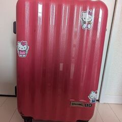 小さなピンクのスーツケース