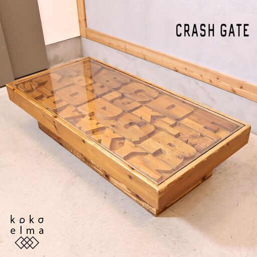 CRASH GATE(クラッシュゲート)のABCセンターテーブルです。杉古材を使用し、ガラスの下にはアンティークの印刷用文字盤をデザインしたカッコいいリビングテーブルはブルックリンスタイルなどに♪