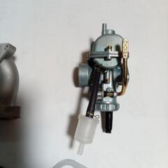 「決まりました」バイク用　(ホンダ横型エンジン)新品キャブレター、マニホールドセットの画像