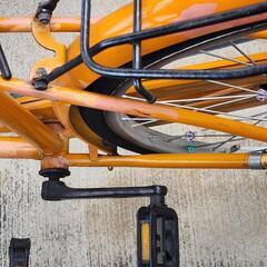 お取引中。オレンジのママチャリの画像