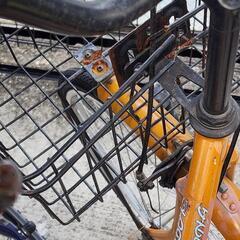 お取引中。オレンジのママチャリの画像