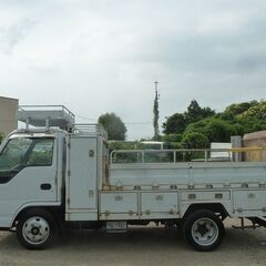 H18  いすゞエルフ1.9ｔ平ボディ　ＰＧ付　水色　3人乗り　スムーサー　集中ドアロック　ABS　エアバック　ルーフキャリア　室内灯　ＡSR　　バイザー　検付き1年　　16910　の画像