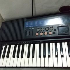 カシオキーボードCT-657＋初心者向けピアノレッスン本（DVD付）の画像