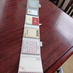 リップグロスとおもしろ手帳の画像