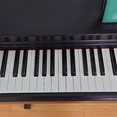 楽器ヤマハ電子ピアノYDP163R椅子付きの画像