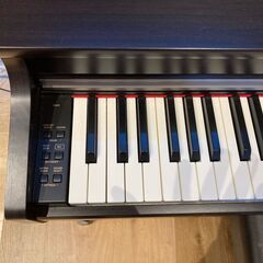 KAWAI　デジタルピアノ『CN25』 プレミアムローズウッド調仕上げ　高低自在椅子あり（ほぼ未使用）の画像