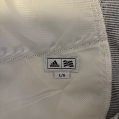 adidasのゴルフスカート&ゴルフの本の画像
