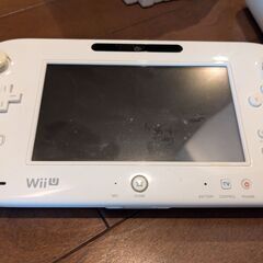 WiiU本体、コントローラー、WiiUソフト3個の画像