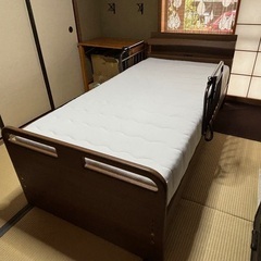 介護ベッド&昇降式サイドテーブルセットの画像