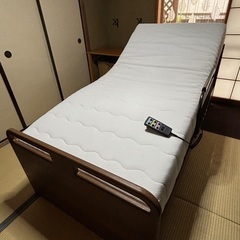 介護ベッド&昇降式サイドテーブルセットの画像