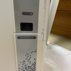 商談中。窓用エアコンの画像