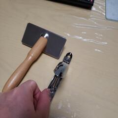 猫用クシと爪切りの画像