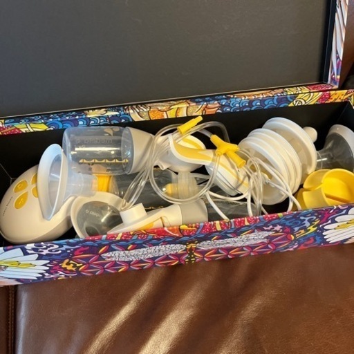 medela 電動
搾乳器
