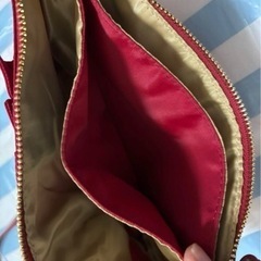 新品クラッチバッグ TeflonTM fabric protect V赤の画像