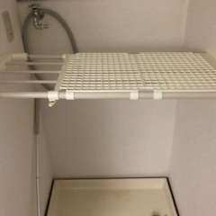 取引中　突っ張り棒の画像