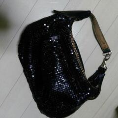 きらきら黒バッグの画像