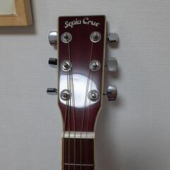 ギターとギターカバーストラップくの画像