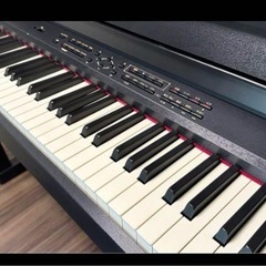 ローランドRolandの電子ピアノ、椅子付きの画像