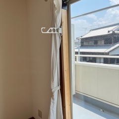部屋干し用物干し竿置きの画像