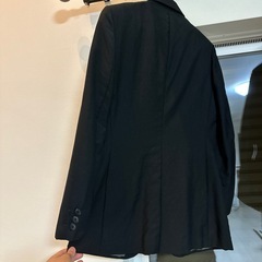 レディースの黒ジャケットの画像